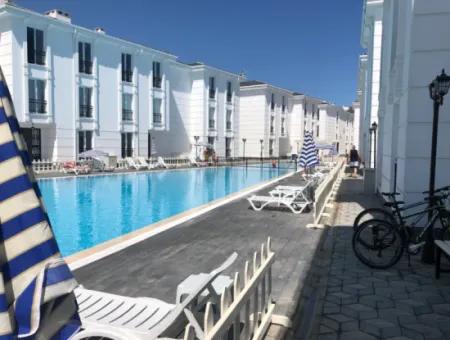 Zu Verkaufen In Einem Komplex Mit Garten Und Pool Am Meer In Kumbağ 2 1