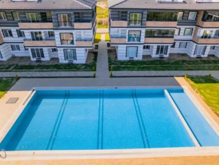 Kumbağ Mimoza Evlerinde Havuzlu Sezonluk Kiralık 3+1 Daire