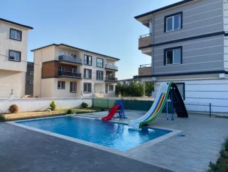 Kumbağ Havuzlu Ve Aquaparklı Sitede Yaz-Kış Kiralık 2+1 Daire